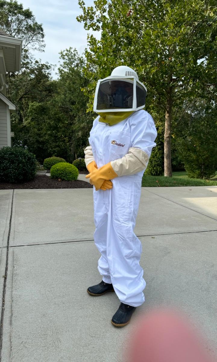 Linda in protective gear handling a pest control job